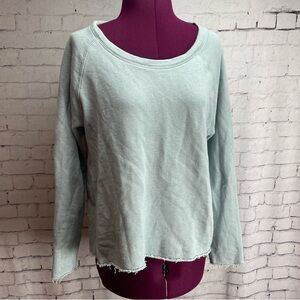 Chaser size medium light blue sweat shirt with circle hole on back